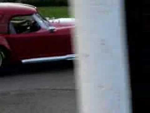 A girl driving a 1967 Shelby Cobra loses it and wipes out