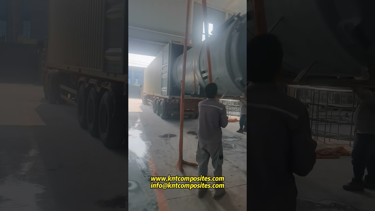 FRP workers discuss pushing the FRP insulation tank into FRP workers discuss pushing the FRP insulation tank into
