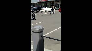 Crazy guy tries to attack police with a hatchet and he gets tazed