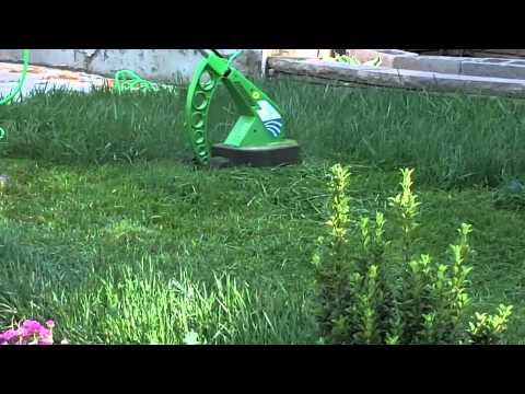 Electric Garden Trimmer on Demonstartion  Ultratrimmer   A 3 In 1 Lawn Mower  Trimmer  Edger