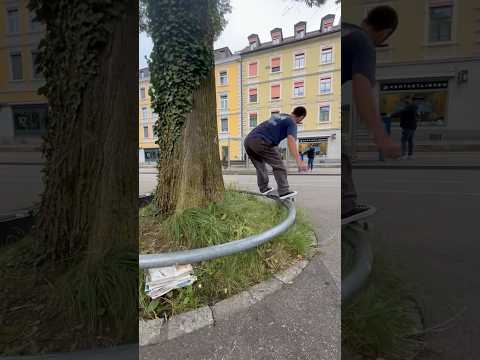 Cal attempts to grind around the tree in Zurich