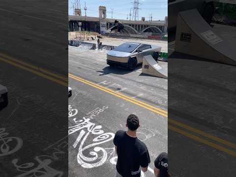Jumping over a Tesla truck!!