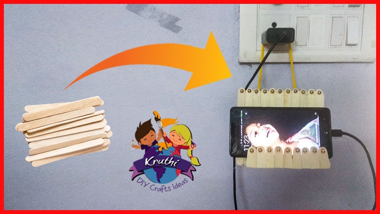 Diy Wall Decor Frame Newspaper Craft Kruthi Ideas Icre Cream Sticks Mobile Charging Holder Popsicle Craft Stand Kruthi Diy Ideas