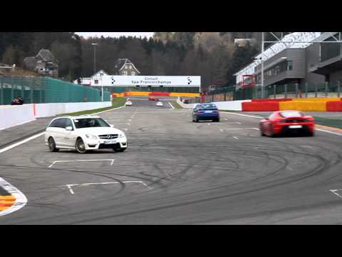 Mercedes C63 AMG Estate drifting through Busstop chicane at 