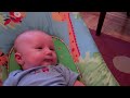Benjamin watching big face rattle