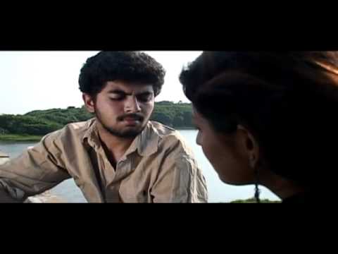 En Mel Vizhuntha Mazhai Thuzi.mp4