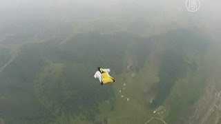 Видео Полёт с 2000 м в костюме белки-летяги (новости) от NTDRussian, Чифын, Китай