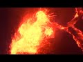 Hawaii's Kilauea volcano lake spatters lava into the air