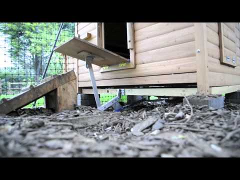 This is my automatic chicken-coop door made from an electric car 