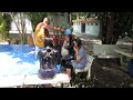 Three beautiful Thai Girls completely soaked by monk in Buddhist water blessing - Thailand - 720p HD
