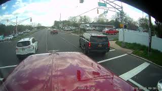 Peterbilt 389 loaded dump truck takes out two cars
