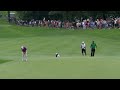 Lee Westwood rolls in a 24-foot birdie putt at Bridgestone