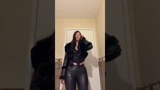 Elegant Woman Dances In Leather Pants And Fur-Trimmed Jacket