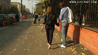Barefoot Girl Walks in Streets with Her Boyfriend