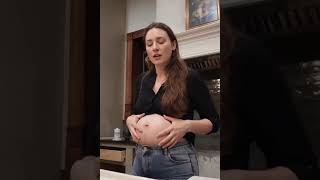 Pretty Woman Big Belly Expansion In Her Living Room
