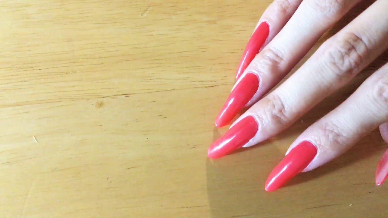 Back scratching with long pink nails