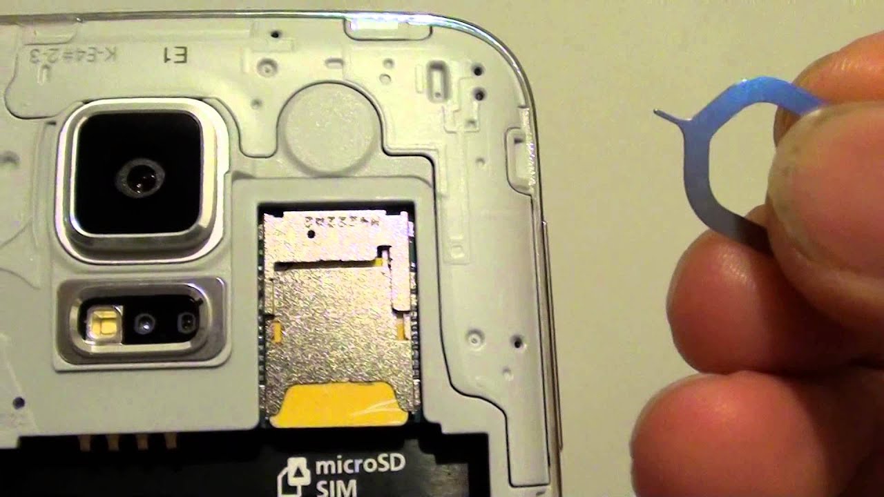 Samsung Galaxy S5: How to Remove SIM Card - YouTube