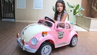 ALICE E BIANCA ANDANDO DE CARRINHO FUSQUINHA - Gabriela Almeida
