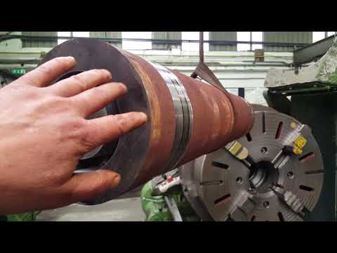 Boring Steel Bar from solid to make 2" thick pipe.