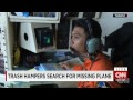 Trash hampers search for missing plane