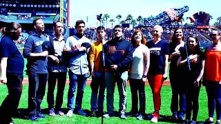 The cast of 'La Cage aux Folles' sing the National Anthem at SF Giants game
