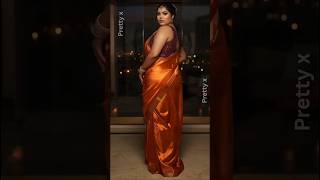Glamorous Plus-Size Beauty In Orange Satin Saree Luxury Villa Look