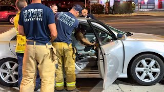 Unconscious Dui Driver Pried From Car On L.a. Sidewalk