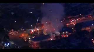 Dramatic scenes as fire rips through Burbank market, California