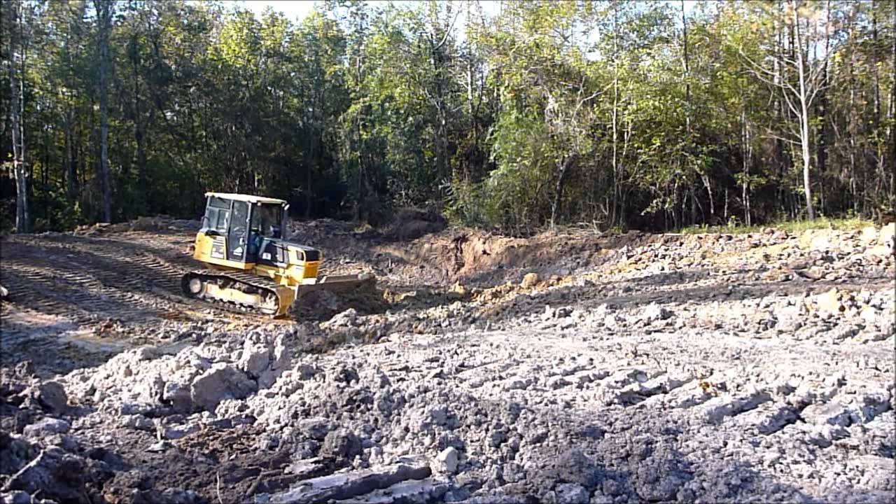Bulldozer Digging Pond - YouTube