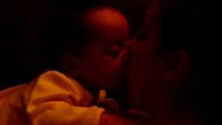 Baby Kissing Mommy