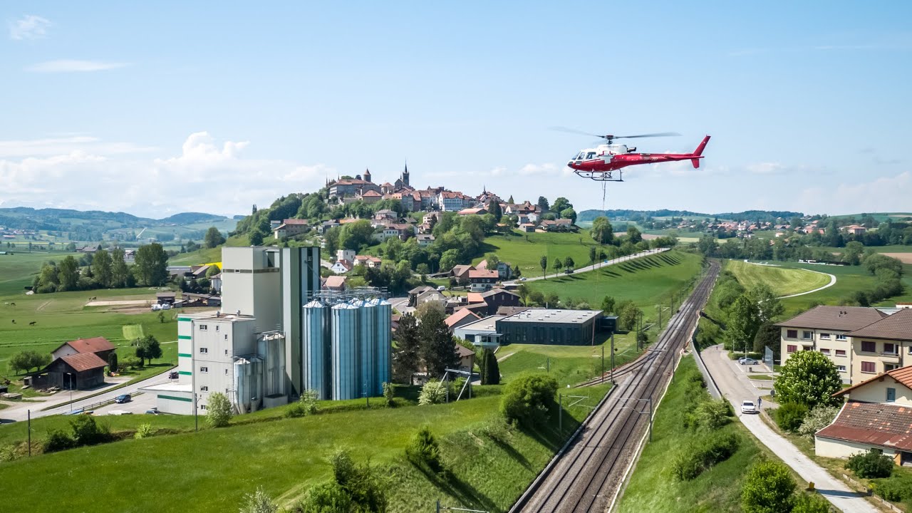 SWISS-FLY BORIS BRON - CFF - Romont - Mise en place des mâts par hélicoptère.