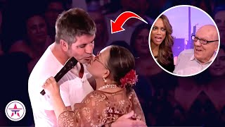 Simon Kisses a Woman on TV as Her Husband is Watching!