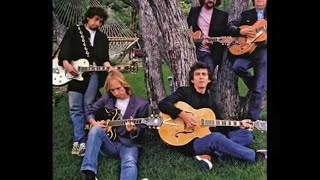 Watch Traveling Wilburys Not Alone Any More video