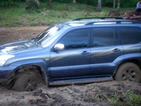 Toyota Land Cruiser Prado off road on mud