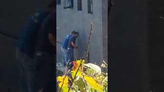 Worker Putting Tiles