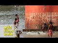 Kids playing in the waters of Hooghly in Kolkata