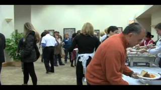 Serving Thanksgiving dinner for Catholic Charities