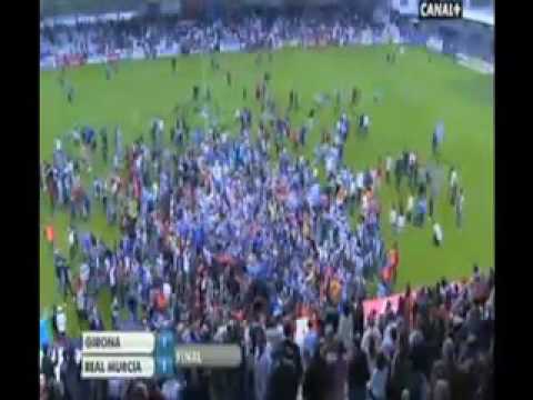 Hercules CF fans storm the field after the team's 21 road victory over Real