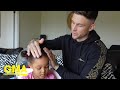 Dad doing his daughter's hair is too cute to watch
