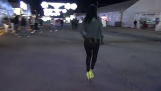 Victoria Devil. Yellow High Heels And Black Leggings At Night Enjoying The Attractions