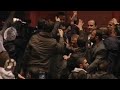 Syria's President Assad mobbed by supporters after speech
