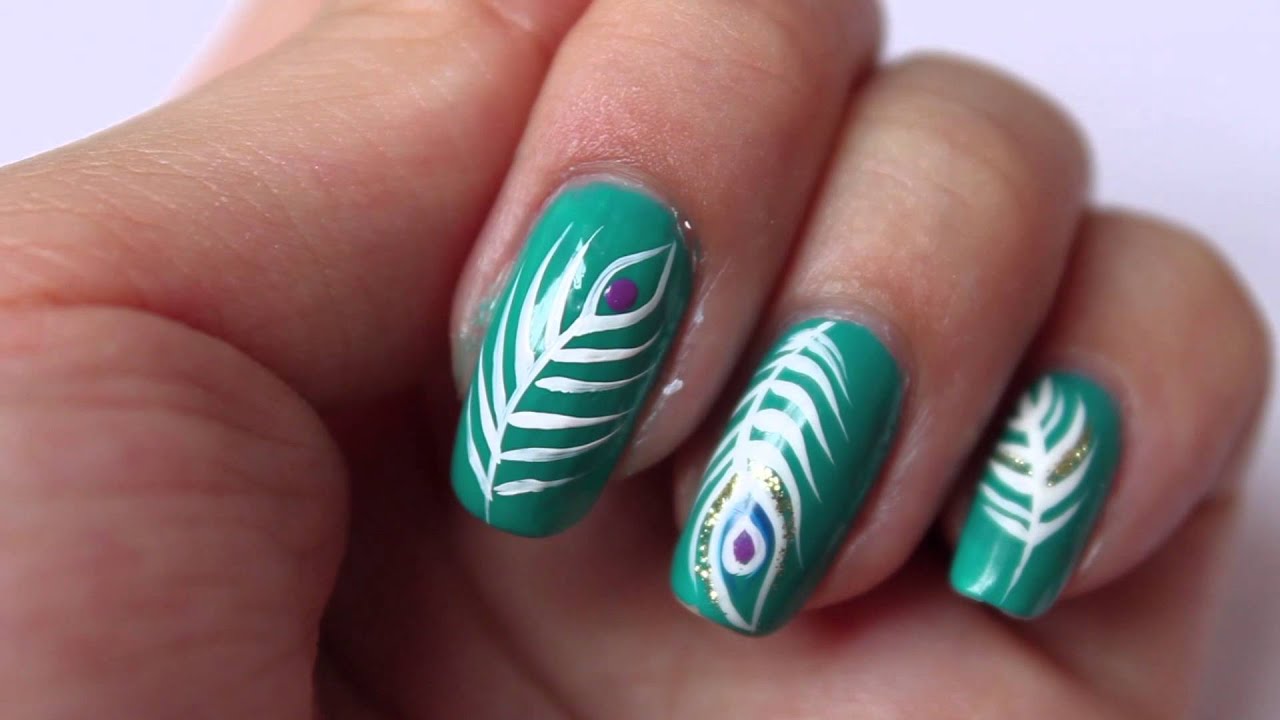 blue peacock feather nail design