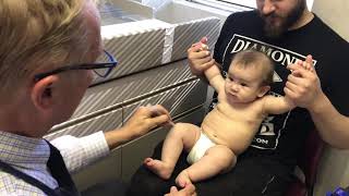Doctor?s adorable song routine for giving shots to 6 month old baby