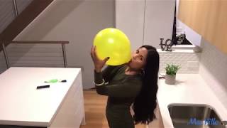 Balloons Of The World Brazil Blowing And Playing With Green, Yellow, Blue And White Balloons