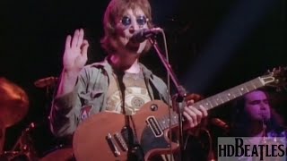 Watch John Lennon Come Together video