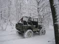 willys jeep cj-2a in snow