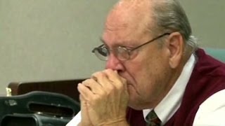 Ex-cop charged in killing weeps at bond hearing  (dirty cop)