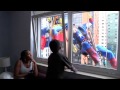 Superhero window cleaners: Superheroes cheer up children in Brazil hospital