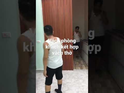 giải pháp vách ốp trang trí bàn thờ và vách ngăn phòng khách với phòng thờ đơn giản tinh tế