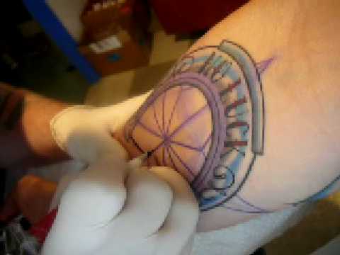 Charles Cain of Mark of Cain Tattoo starts the outline on a traditional Charles Cain of Mark of Cain Tattoo starts the outline on a traditional